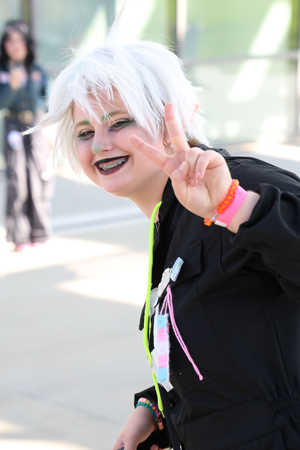 Teen throwing the peace sign
