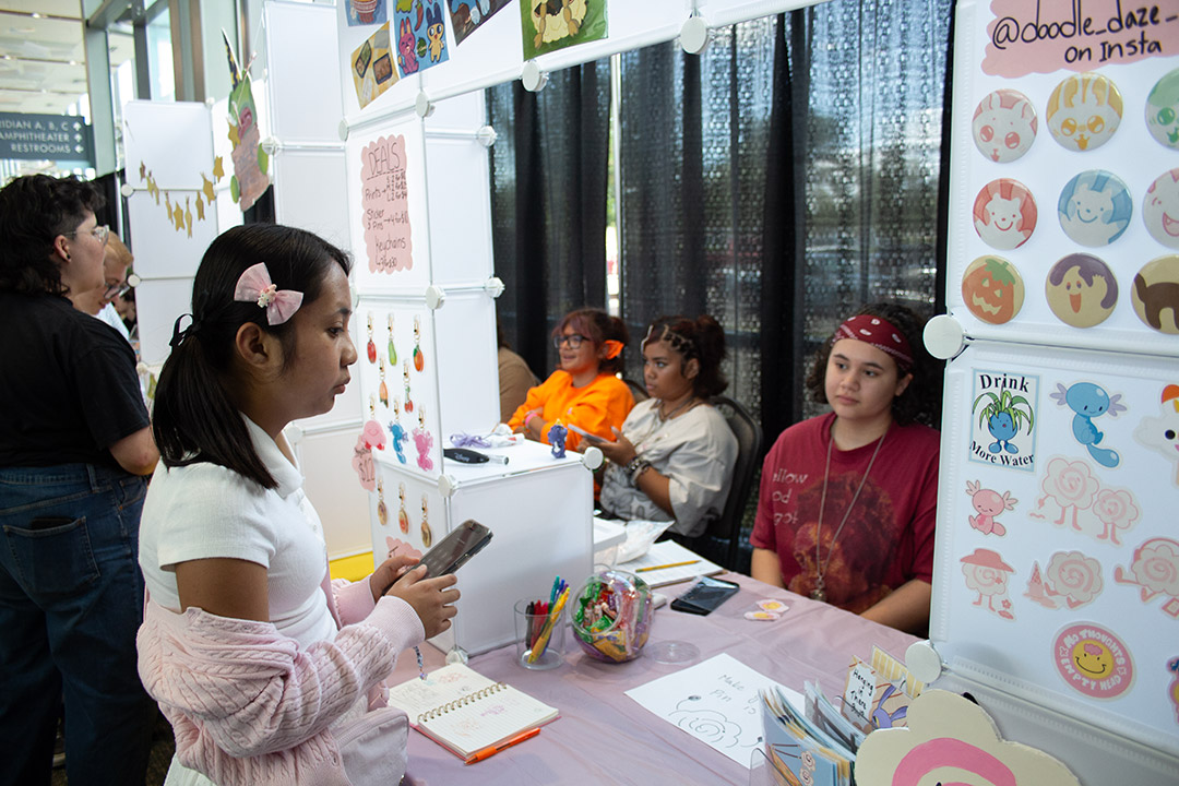 Attendees at vendor booths