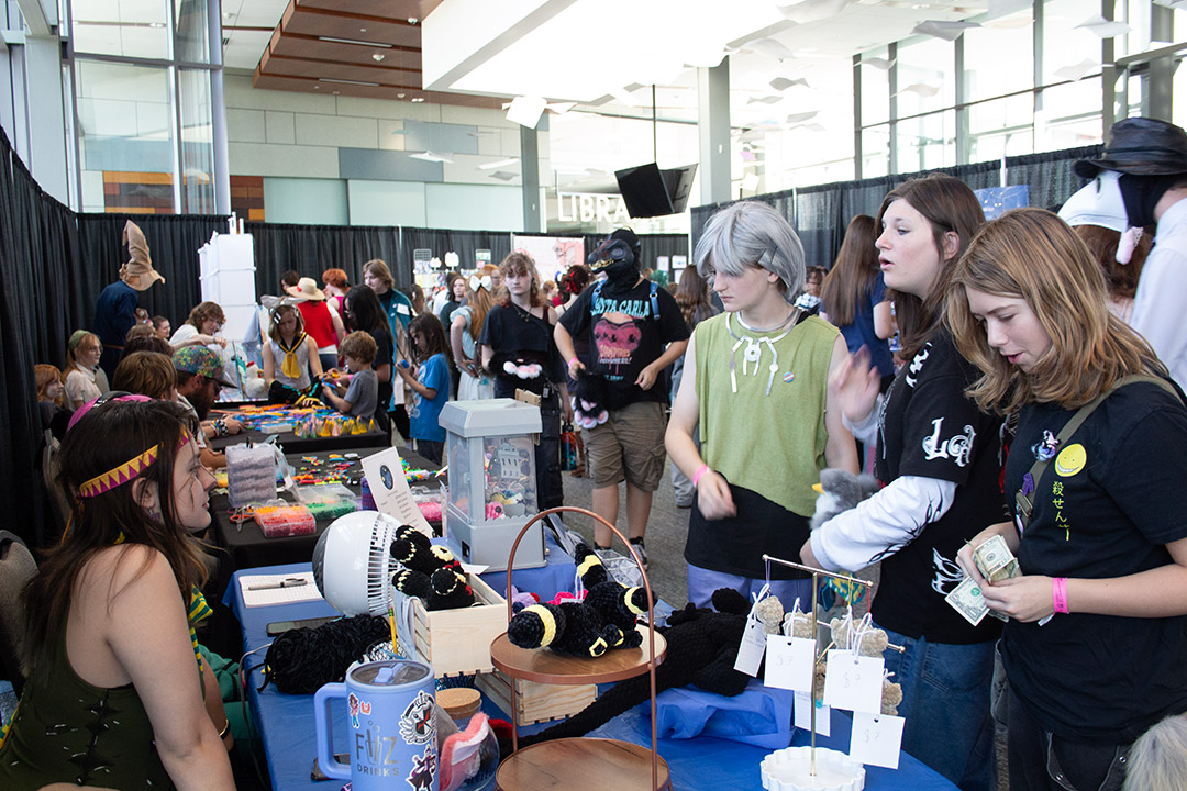 Attendees at vendor booths